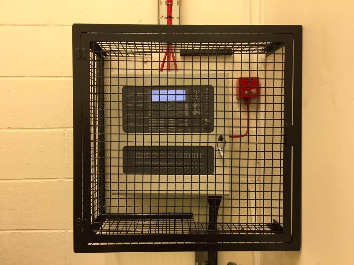 Metal cage for control unit. Bancroft's School