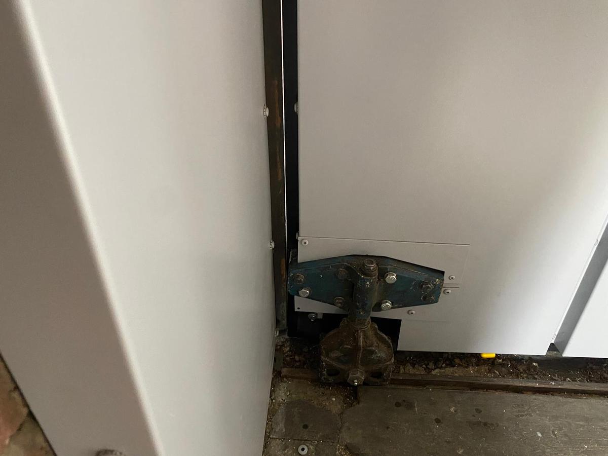 Repair of Door Rollers, Natural History Museum